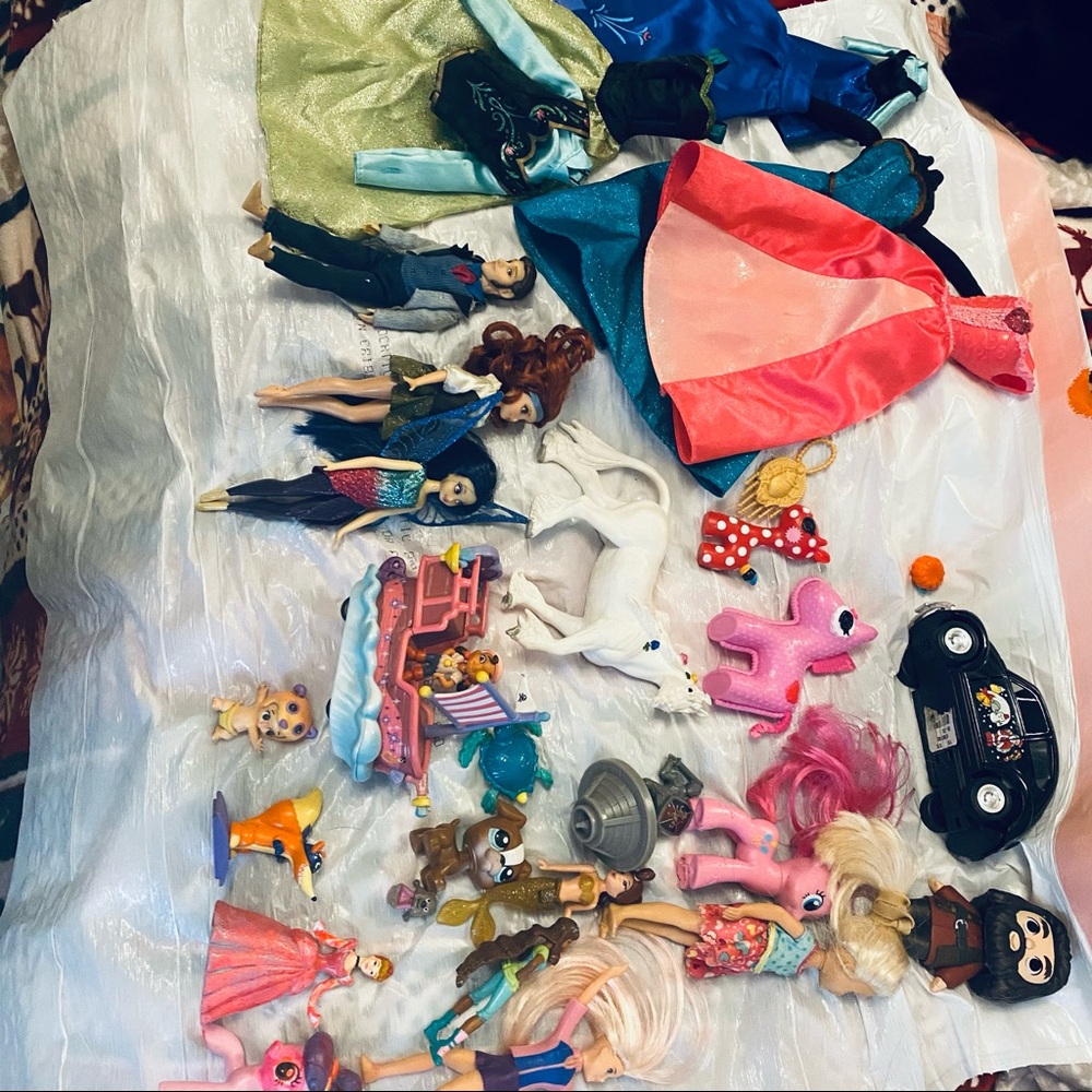 Assortment of Disney Barbie toys